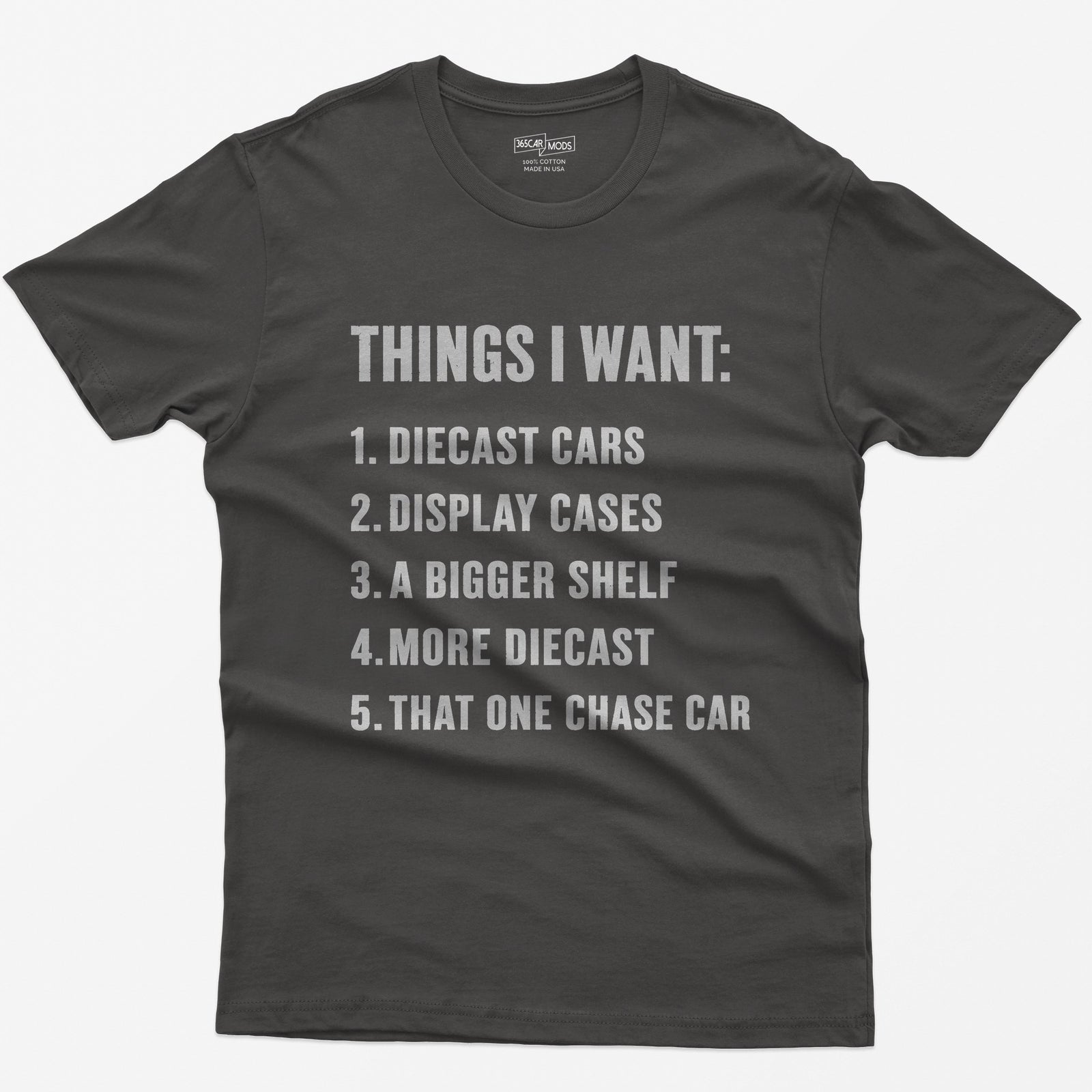 Dark Heather t-shirt with white block text Things I Want list: diecast cars, display cases, a bigger shelf, that one chase car