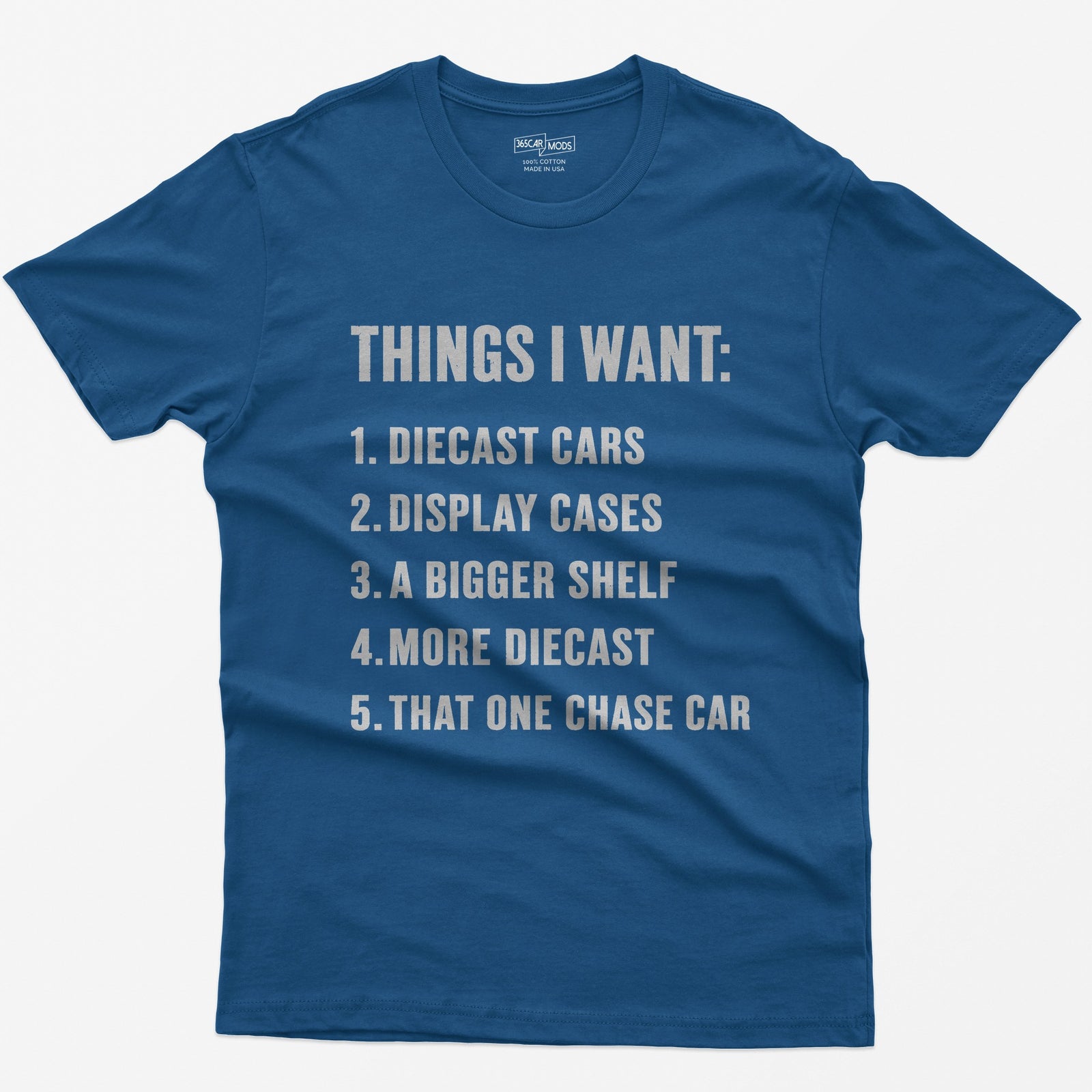 Royal t-shirt with white block text Things I Want list: diecast cars, display cases, a bigger shelf, that one chase car