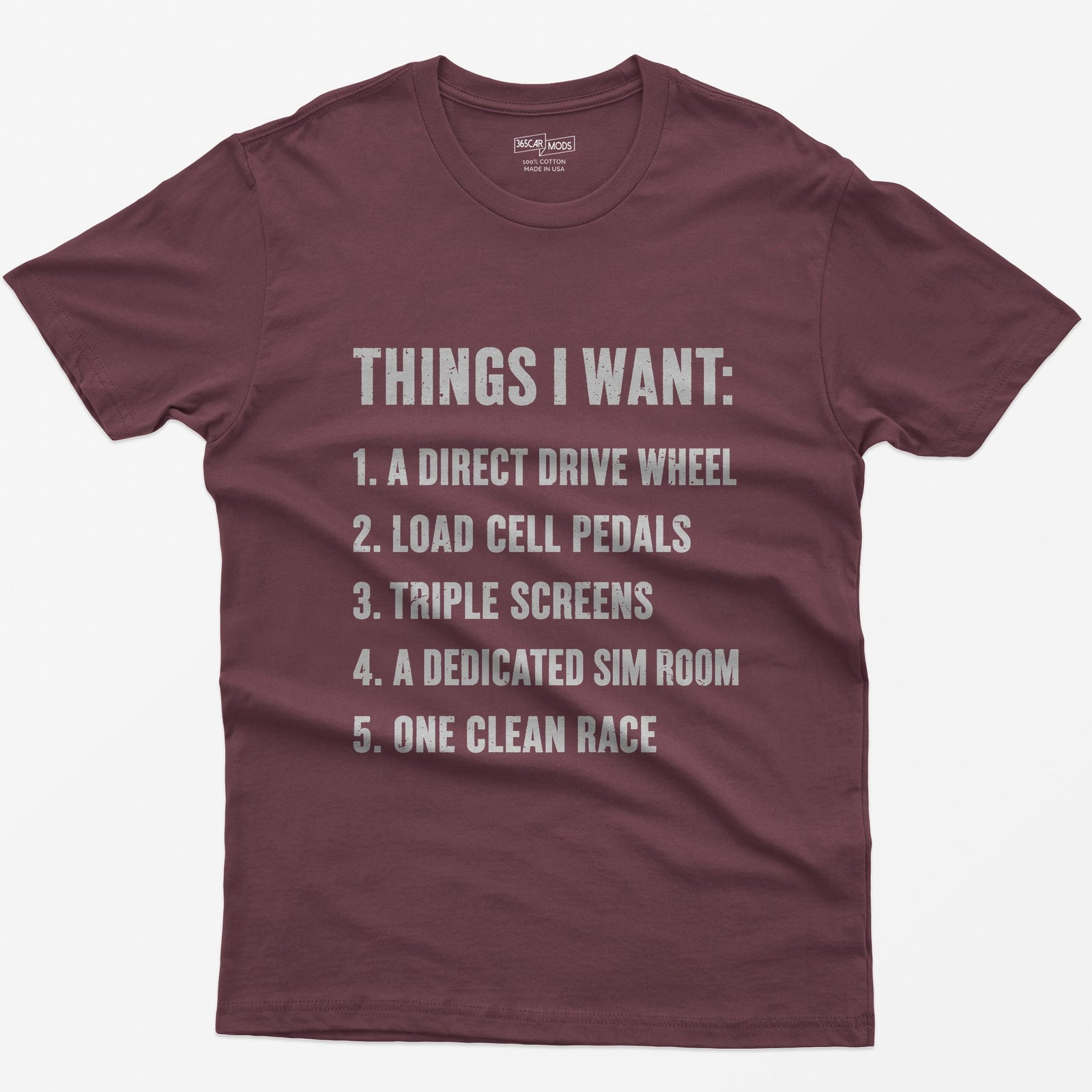 Maroon t-shirt with Things I Want list: direct drive wheel, load cell pedals, triple screens, sim room, one clean race