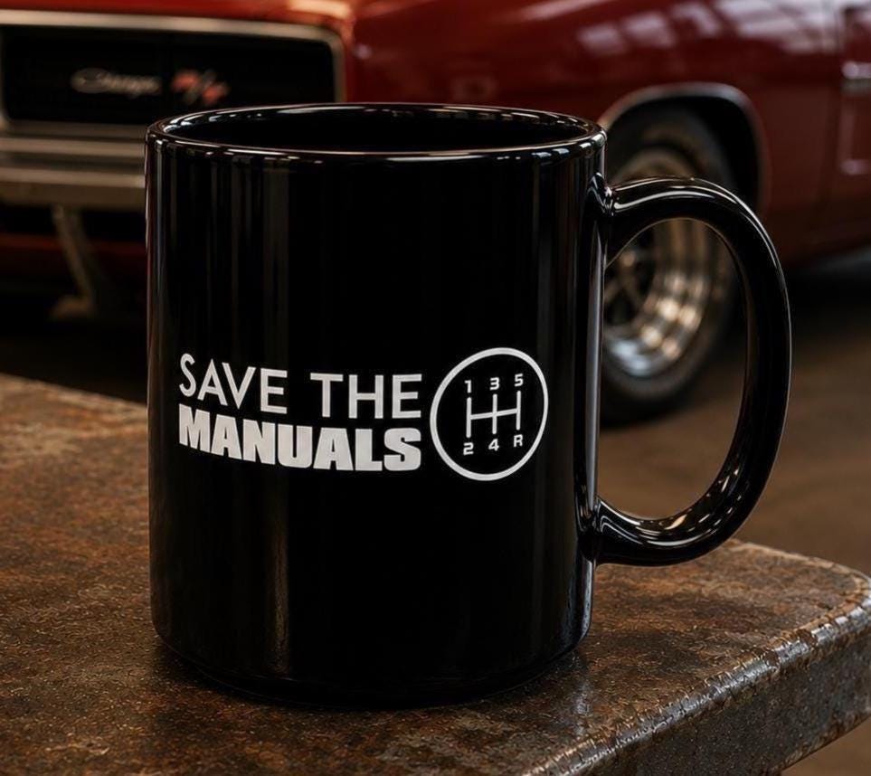 Save The Manuals Car Mug - 15oz black coffee mug, angled view