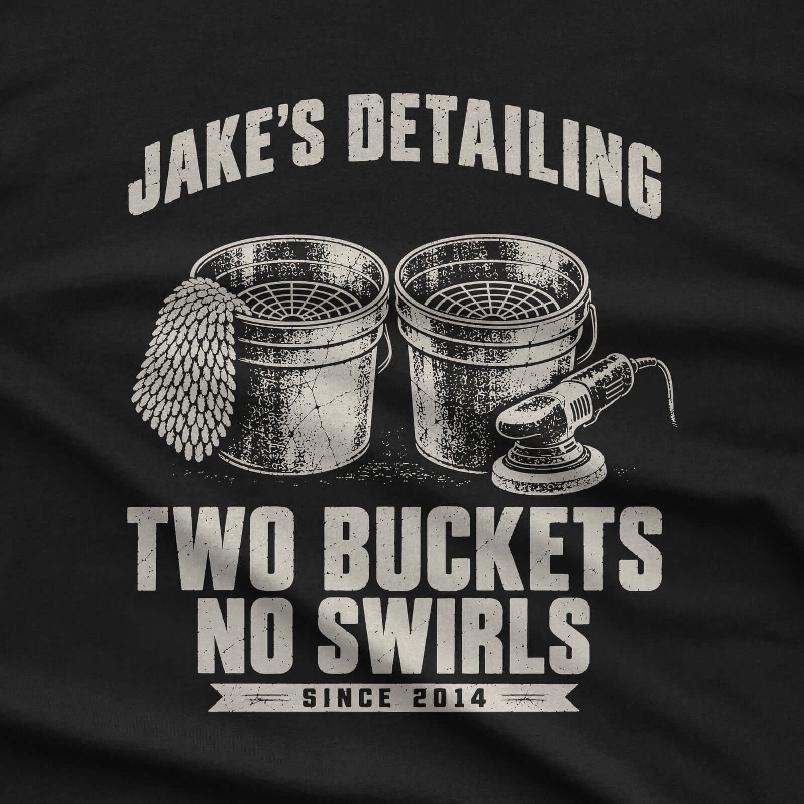 Black t-shirt with two wash buckets and personalized Jake’s Detailing Two Buckets No Swirls Since 2014 print