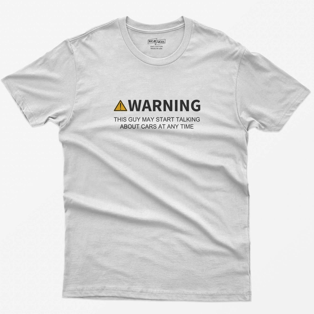 White t-shirt with yellow warning triangle and text Warning This Guy May Start Talking About Cars At Any Time on the chest