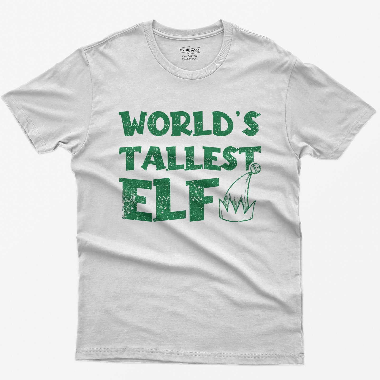 White t-shirt with green distressed text World's Tallest Elf and a small elf hat with a bell
