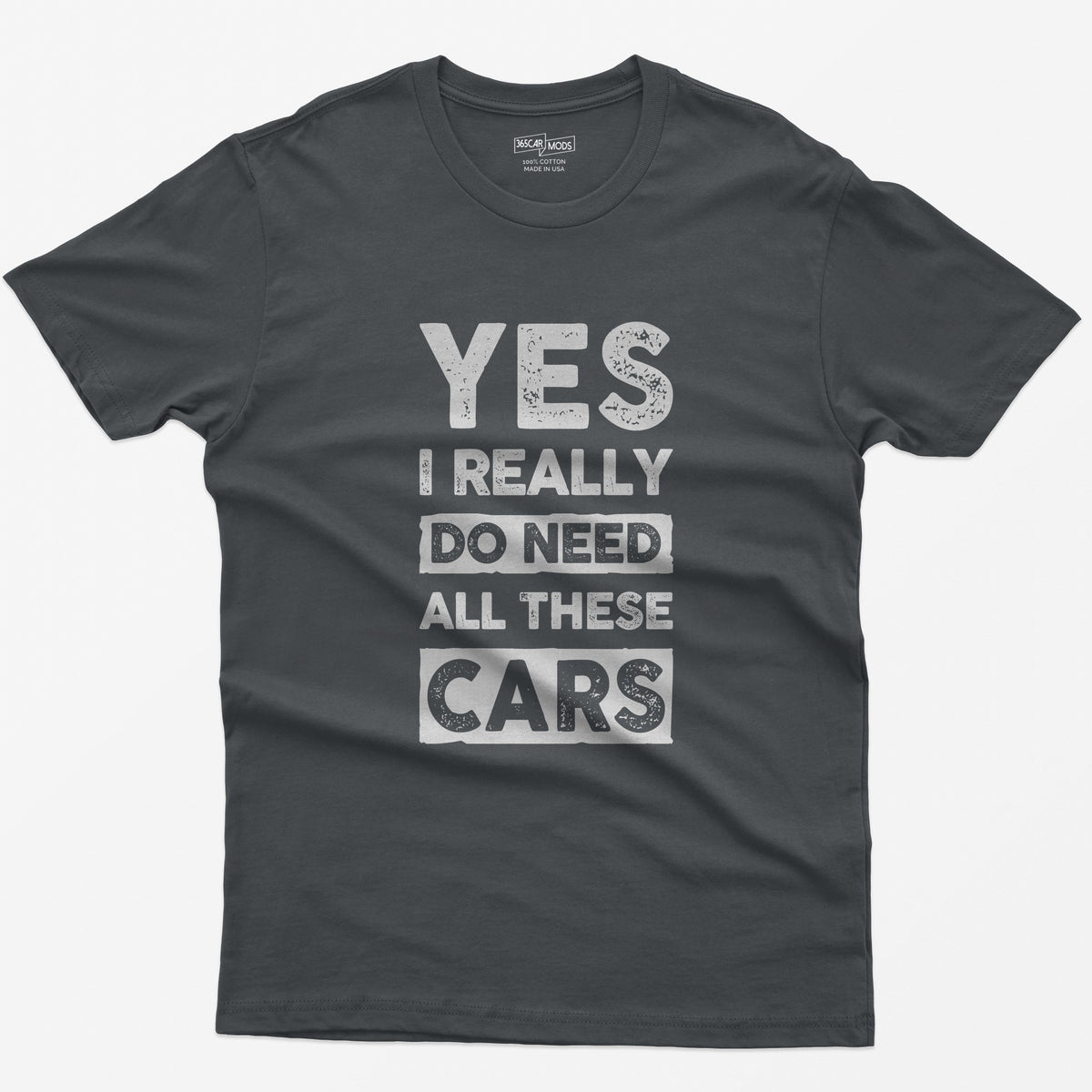 Charcoal t-shirt with distressed white block letters reading Yes I Really Do Need All These Cars