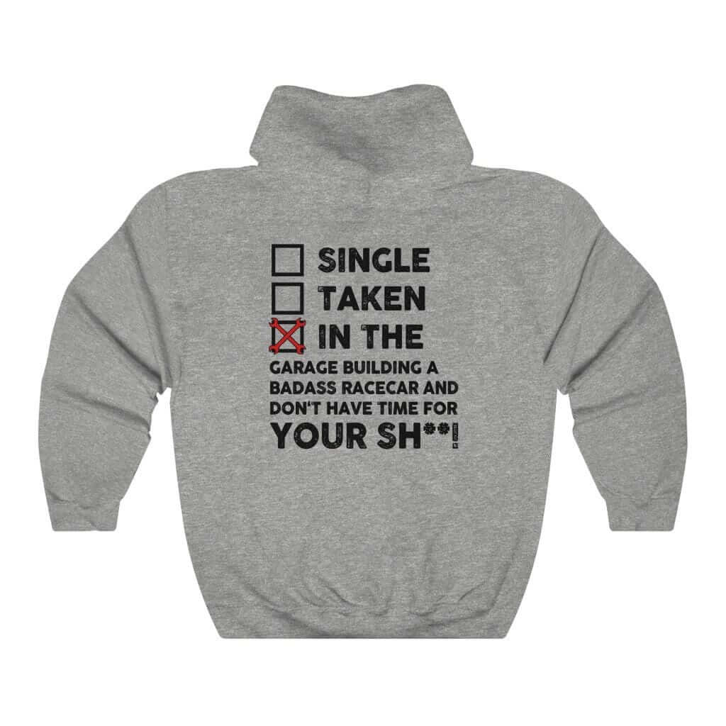 in the garage building a racecar sport grey hoodie, white background