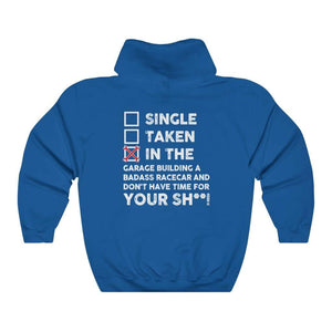 in the garage building a racecar royal blue hoodie, white background