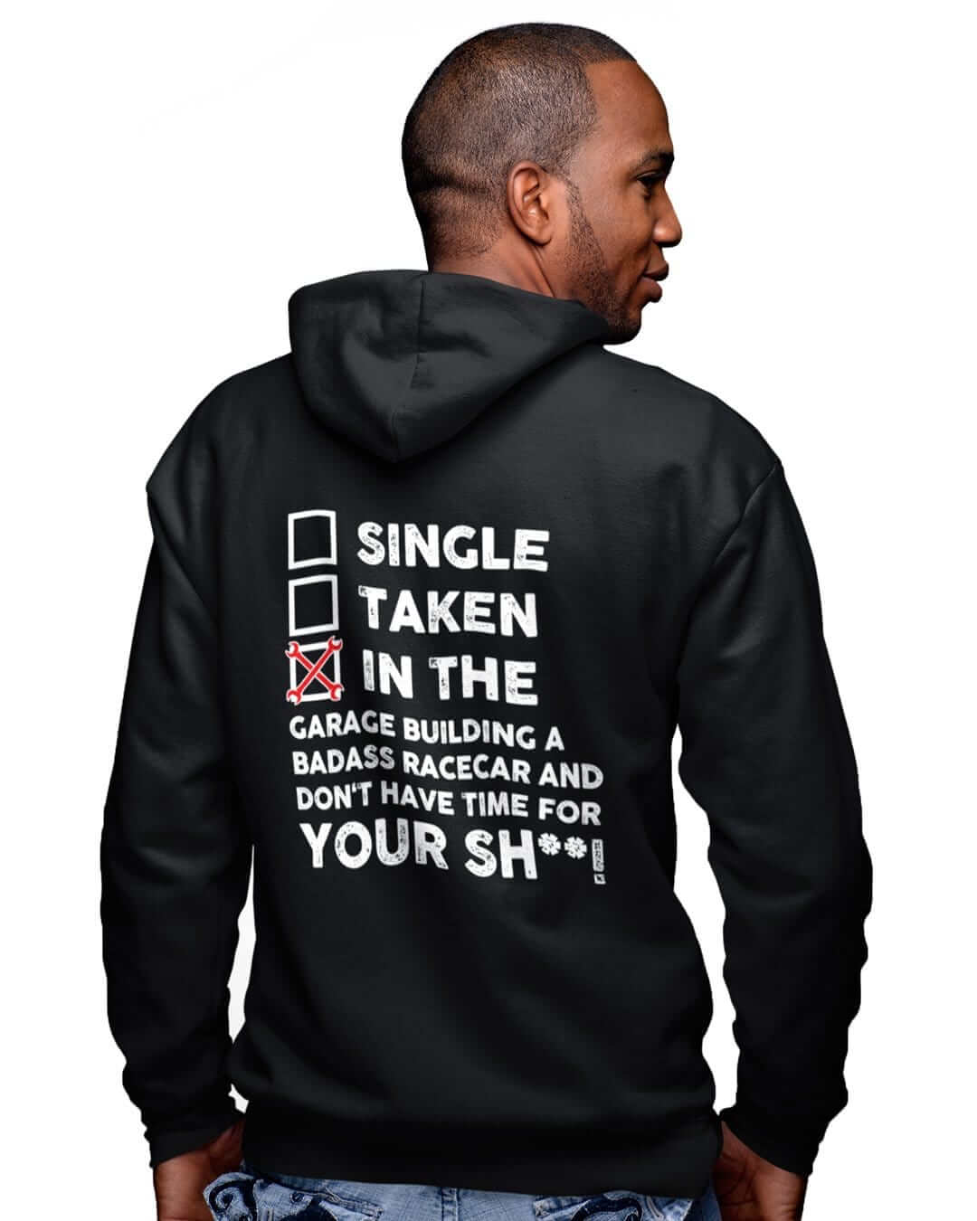 in the garage building a racecar black hoodie, white background