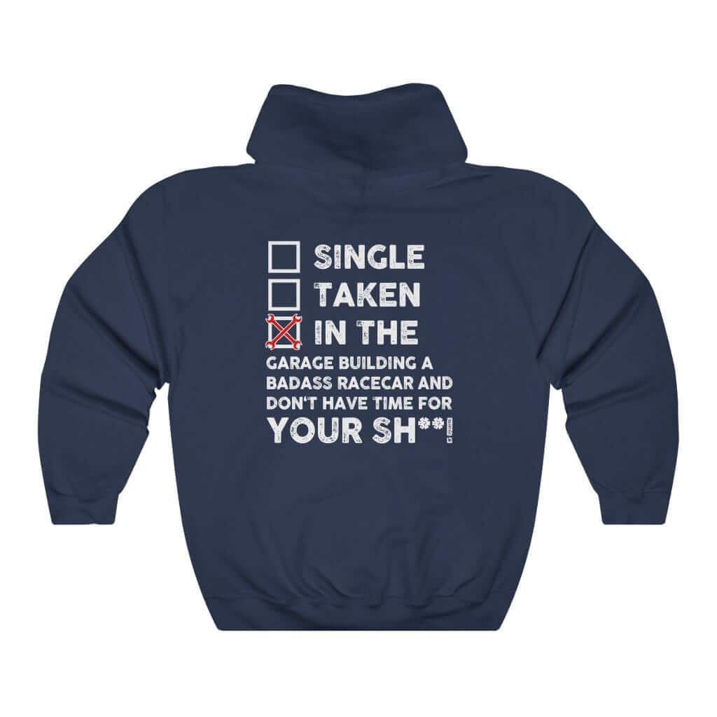 in the garage building a racecar navy hoodie, white background