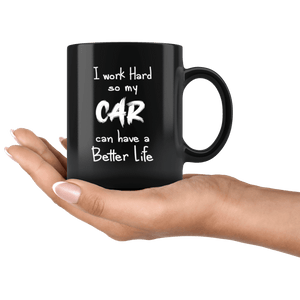 black ceramic mug with funny text "I work hard so my car can have a better life" printed on it made for car guys