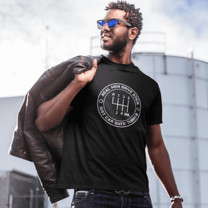petrolhead who's wearing a "Real men drive stick" car t-shirt made for car guys, JDM drifting t-shirt, save the manuals t-shirt, 3 pedals - clutch brake gas, a cool t-shirt made for drifters and car lovers, made in the USA, excellent quality print, free shipping, sale 40% off,  car enthusiasts love it, black color